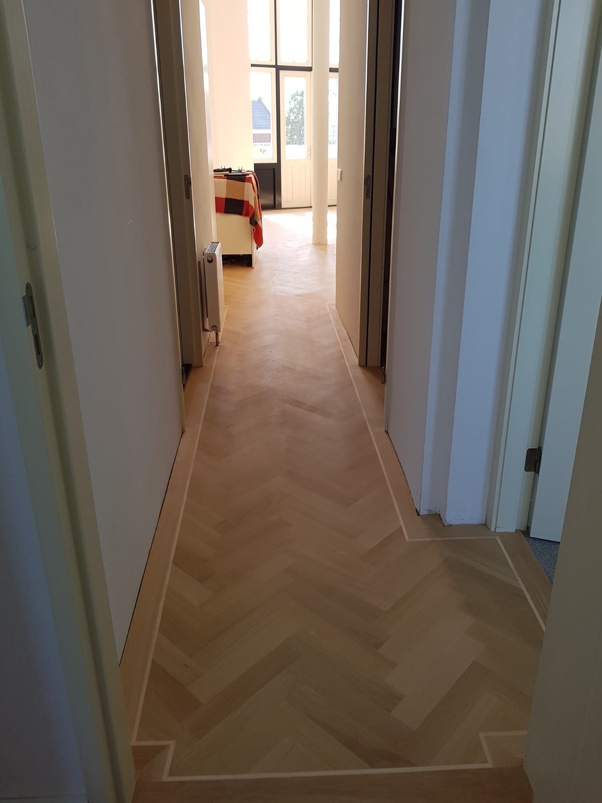 Visgraat vloeren in Nijmegen Neerlandia Houten Vloeren